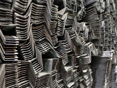 İnşaat deposundaki metal barların arka planı..