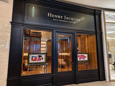 KUALA LUMPUR, MALAYSIA - AUGUST 28, 2024: Henry Jacques brand retail shop in the large shopping mall. clipart