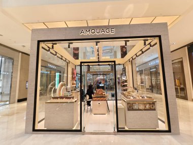 KUALA LUMPUR, MALAYSIA - AUGUST 28, 2024: Amouage brand retail shop in the large shopping mall. clipart