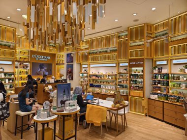 KUALA LUMPUR, MALAYSIA - AUGUST 28, 2024: LOccitane brand retail shop in the large shopping mall. clipart