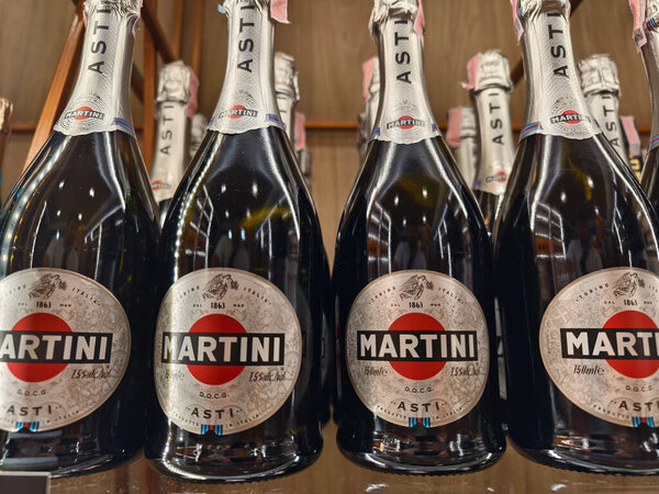 PHUKET, THAILAND - MARCH 8, 2025: Bottles of Martini on a shelf in a supermarket.