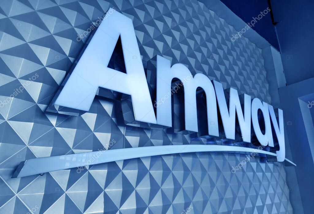 MAY 08, 2025 - PHUKET, THAILAND: The logo of the brand Amway on the wall.