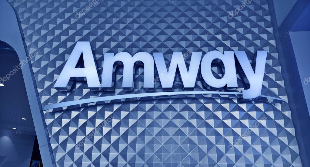 MAY 08, 2025 - PHUKET, THAILAND: The logo of the brand Amway on the wall.