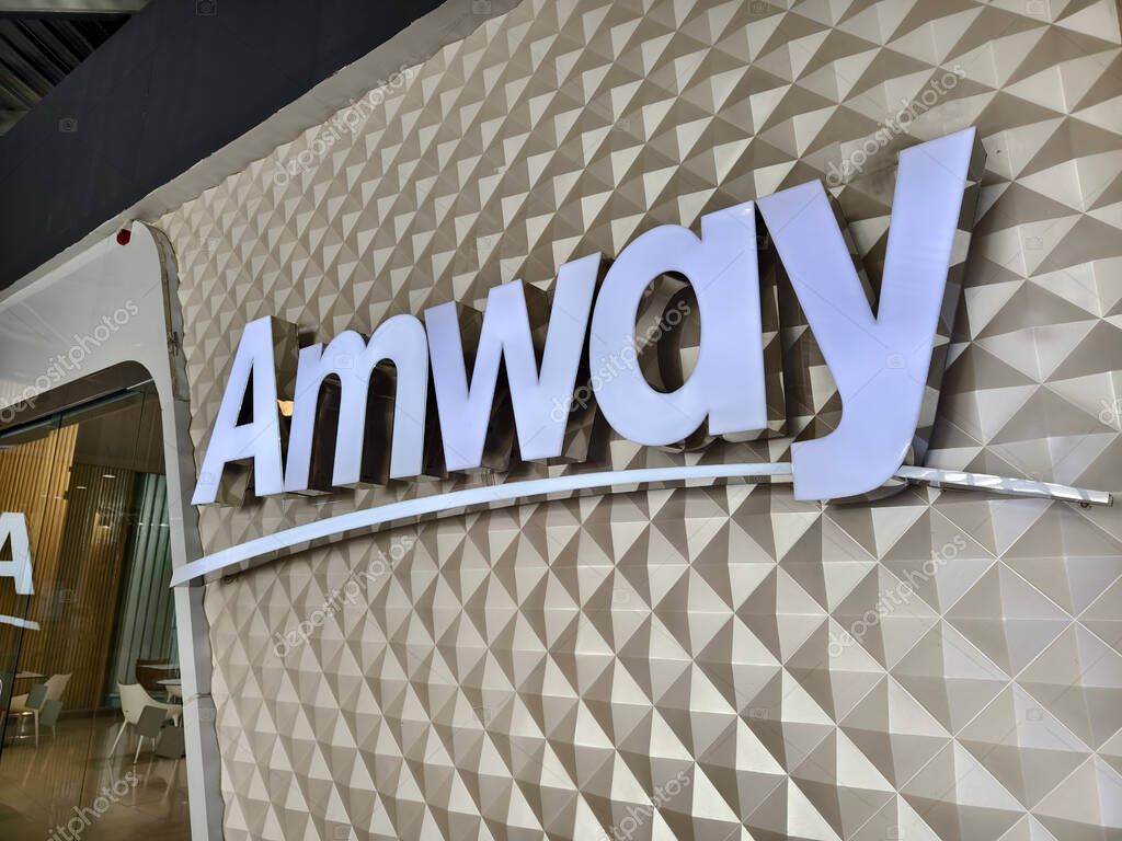 MAY 08, 2025 - PHUKET, THAILAND: The logo of the brand Amway on the wall.