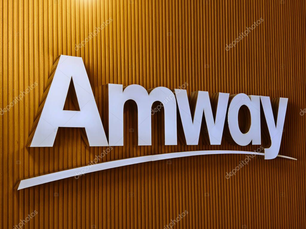 MAY 08, 2025 - PHUKET, THAILAND: The logo of the brand Amway on the wall.