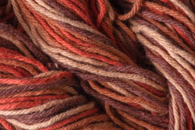 Close-up tangled yarn directly above as backgound