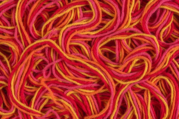 Tangled yarn directly above as background