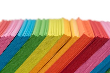 Close-up pile of sticky note pads isolated on white background