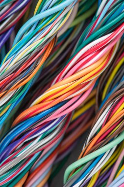 Colored electric cables and wires closeup