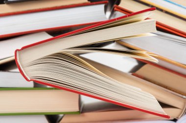 Opened hardcover book in library, close-up