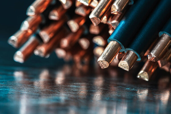 Close-up of a stack of steel rods, a raw material of the metallurgical industry