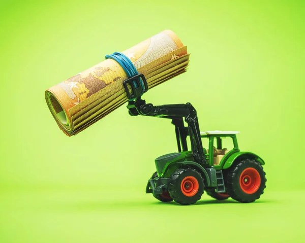 Трактор Грошима Зеленому Фоні Бізнес Фінансова Концепція Euro Roll Tractor Ліцензійні Стокові Зображення