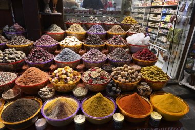 Dubai spice market Souk stalls with exotic condiments additives spices teas