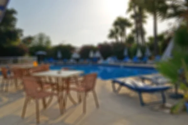 Blurred Background Beautiful Sunset Pool Side Chairs Trees — Stock Photo, Image