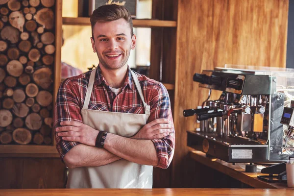 Handsome Young Barista Apron Looking Camera Smiling While Standing Crossed — Stock Photo, Image
