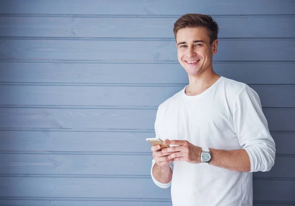 Portrait Handsome Young Man Casual Clothes Using Smartphone Looking Camera — Stock Photo, Image