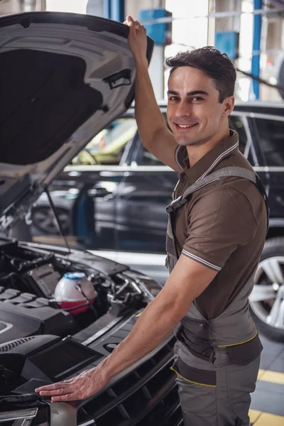 Handsome Young Auto Mechanic Uniform Looking Camera Smiling While Examining — Stock Photo, Image