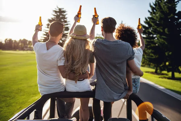 Back View Happy Young People Holding Bottles Beverage Talking While — Stock Photo, Image