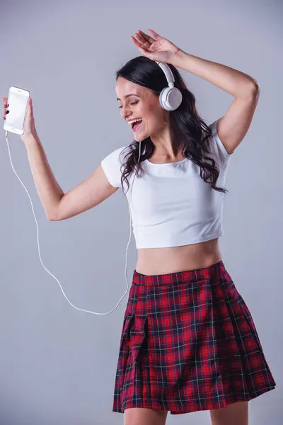 Attractive Young Woman Top Skirt Listening Music Using Smartphone Smiling — Stock Photo, Image