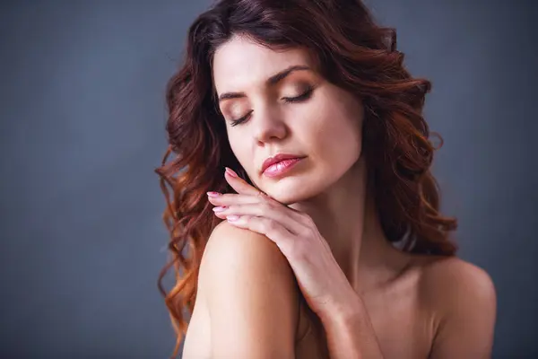 Stock image Portrait of young beautiful sexy girl on black background