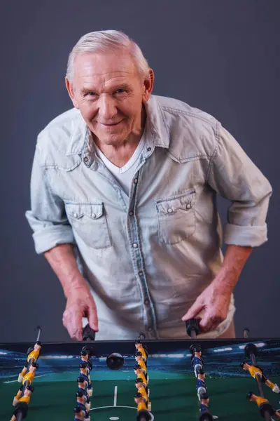 Handsome Old Man Casual Clothes Playing Table Football Looking Camera — Stock Photo, Image