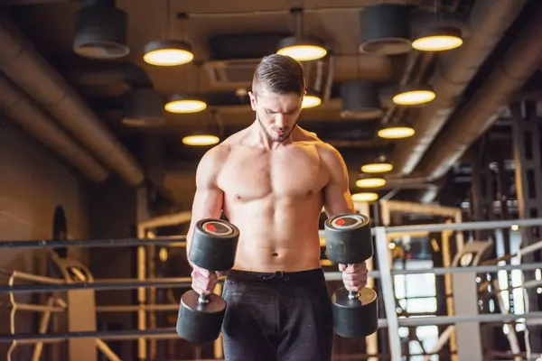Young Strong Man Training Gym Royalty Free Stock Images