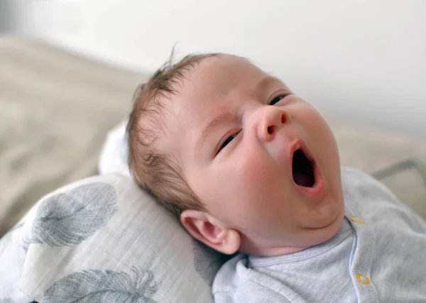 Adorable Newborn Baby Boy Yawning Bed Home Close Portrait — Stock Photo, Image