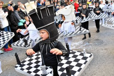 TORREVIEJA, SPAIN  FEBRUARY 12 2023 Kids in a colorful carnival costumes at a festive parade, Alicante, Costa blanca region. Spain