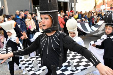 TORREVIEJA, SPAIN  FEBRUARY 12 2023 Kids in a colorful carnival costumes at a festive parade, Alicante, Costa blanca region. Spain