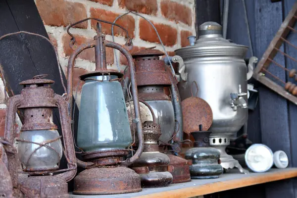 Vintage metal lamps. Antique rusty kerosene lamps. Old