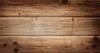 Old brown grunge dark textured wooden background.