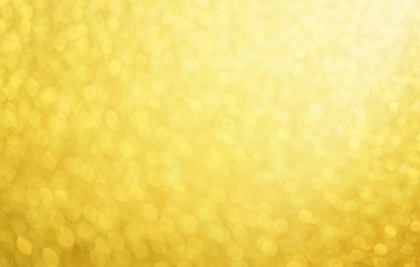a beautifully abstract shiny gold bokeh background. clipart
