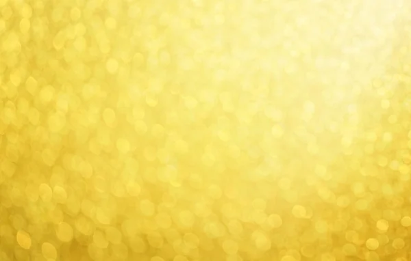 美しい抽象的な金色のボケの背景 ロイヤリティフリーのストック画像