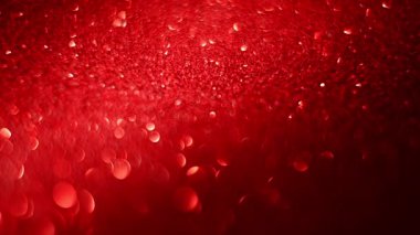 Odaklanamayan soyut kırmızı Noel arkaplanı.