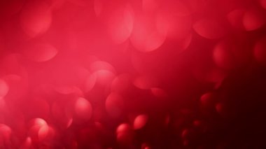 Noel ve tatil sahneleri için ideal, odak değiştiren kırmızı parıltılı bokeh.