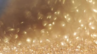 Değişen odaklı altın bokeh arkaplan, bayram sahneleri için ideal