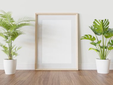 Ahşap çerçeve, iç kısımda, bitkilerin maketi ile birlikte yere dayanıyor. 3 boyutlu bir resimde çerçevelenmiş bir resmin şablonu