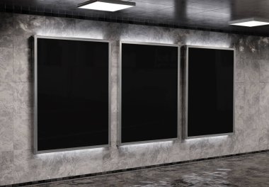 Yeraltı metro duvarında üç tane dikey reklam panosu var. Üç boyutlu reklam tablosu, tren istasyonunun iç mekânına istifçilik.