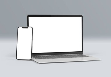 PARIS - France - March 15, 2023: Newly released Apple Macbook Air and Iphone 14, Silver color. Side view. 3d rendering laptop screen mockup on grey background clipart