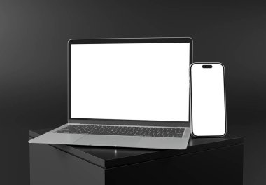 PARIS - Fransa - 27 Şubat 2024: Apple Macbook Air ve Iphone 15, Silver color. Yan görüş. Siyah arkaplanda 3D dizüstü bilgisayar modellemesi