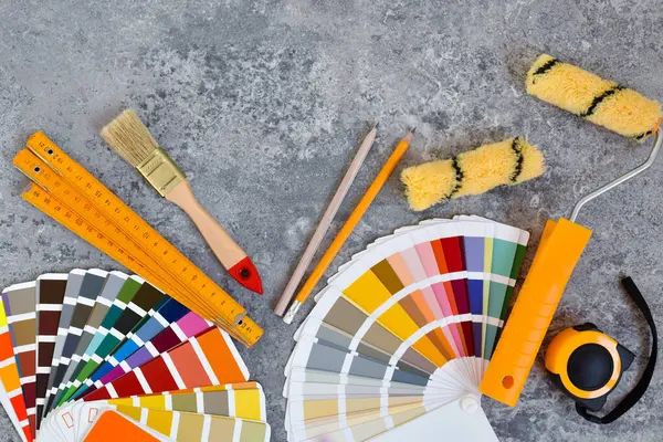 Home Paint Roller Paint Brushe Color Swatches Gray Stone Background Jogdíjmentes Stock Képek