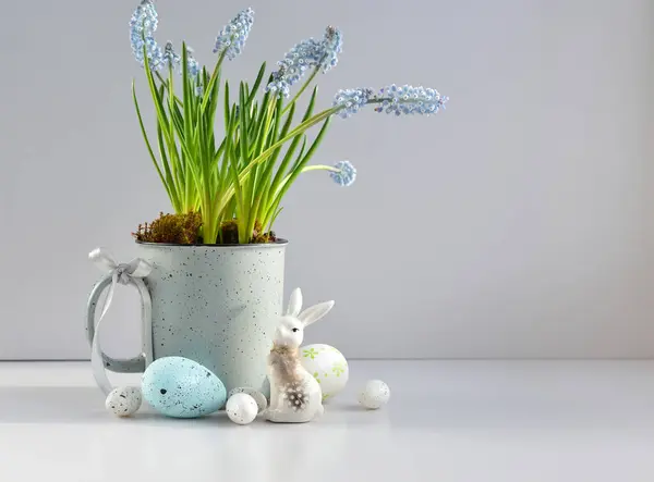 Easter Composition White Rabbit Eggs Light Blue Muscari Flowers Cup — Stock Photo, Image