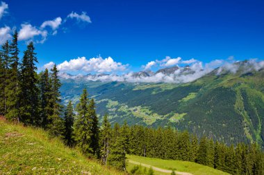 Summer landscape in mountains and blue sky with clouds. Location place Alps, Tyrol, Austria, Europe.