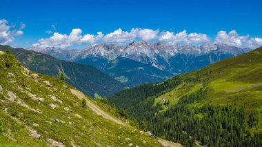 Summer landscape in mountains and blue sky with clouds. Location place Alps, Tyrol, Austria, Europe.