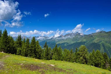 Summer landscape in mountains and blue sky with clouds. Location place Alps, Tyrol, Austria, Europe.