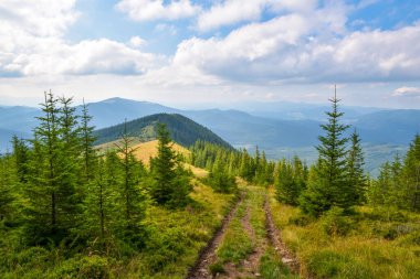 Beautiful summer landscape in mountains and blue sky with clouds