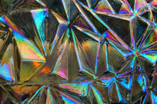 Gökkuşağı cam vazosunun bir parçası tüm fotoğrafı dolduruyor..