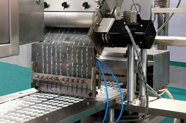 Close-up view of a Packaging machine in pharma industry
