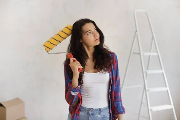 How Make Renovation Portrait Thoughtful Young Woman Holding Paint Roller Royalty Free Stock Images