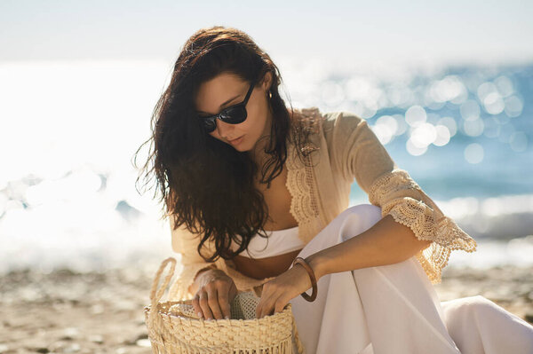 Stylish Beach Woman Model Sunglasses Sits Sea Reaching Her Straw Royalty Free Stock Photos
